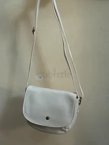 Small white crossbody bag with adjustable strap