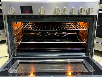 Used freestanding stainless steel electric oven with rotisserie, good condition