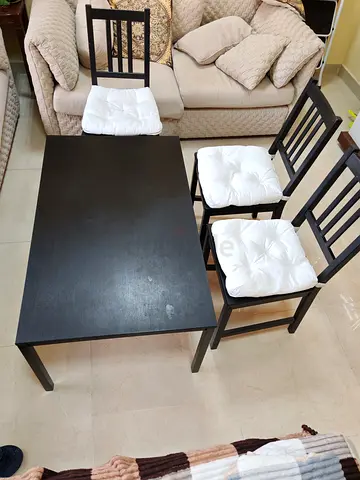 Solid wood dining table with 3 chairs (dark finish) - good condition