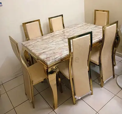 Brand new Top marble dinning Table with 6 Chairs Available