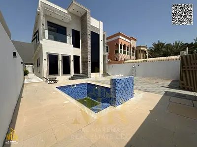 للبيع – فيلا فاخرة على شارع الشيخ عمار – الروضة 2، عجمان | طابقين | 5 غرف نوم ماستر | مجلس | صالتان | مسبح خاص | حوش خارجي واسع
