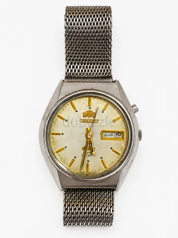 1970s Rare Collectible: Orient Automatic 21 Jewels (Vintage Cream Dial, Arabic Day‑Date Display)