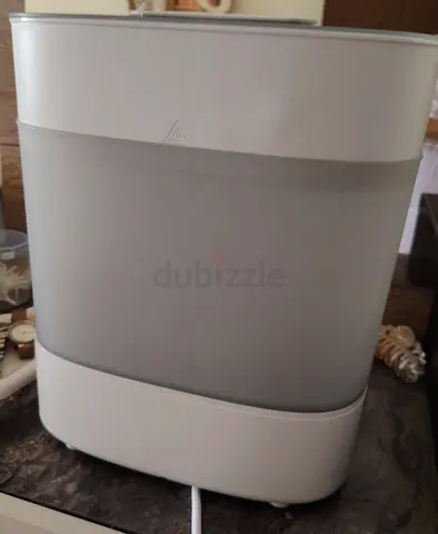 Used white humidifier - compact bedside model