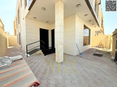 Luxury villa for sale in Al Yasmin, Ajman, including air conditioning, electricity, and water.