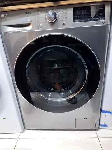 LG 10/7 kg washing with dryer like new perfect working new model free delivery with warranty