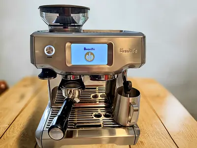 Sage / Breville Barista Touch espresso machine in stainless steel.