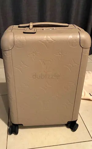 Louis Vuitton embossed leather carry-on spinner suitcase