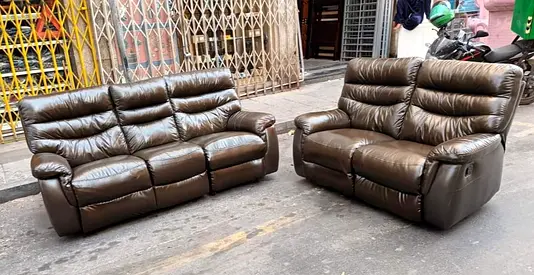 Brown leather reclining sofa set — 3-seater and 2-seater