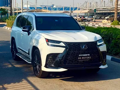 2025 Lexus LX700h F SPORT (GCC Specs) in White exterior with Red (Circuit Red/Flair Red) interior.