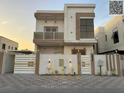 Two-story villa in Al Zahia, close to amenities, 5 bedrooms, living room, majlis, and hall, at a special price including electricity and water fees, i