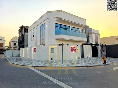 Corner villa for sale in Al Bahia, two floors and a roof, price including registration fees