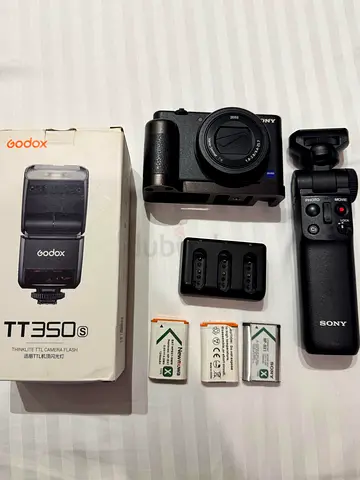 Sony ZV-1 Vlogging Camera + GP-VPT2BT Grip, Godox Flash  3 Batteries - Full Kit