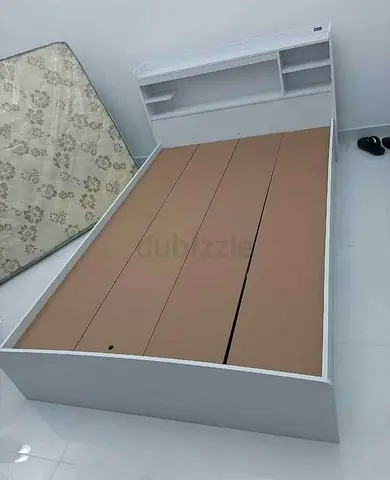 BRAND NEW DOUBLE SIZE WOOD BED WITH MATTRESS AVAILABLE