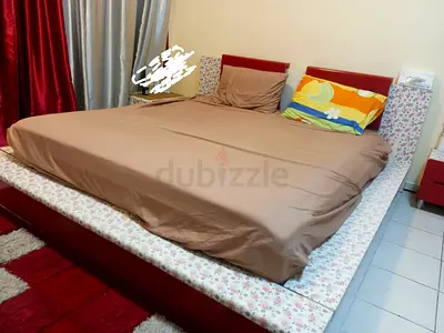 Bed with side tables