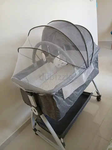 Grey Baby Bassinet with Mosquito Net and Hanging Toys