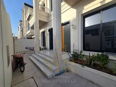 Own your dream villa in the heart of Ajman, close to amenities. Two floors and a rooftop. Includes fees, water, electricity, and air conditioning.