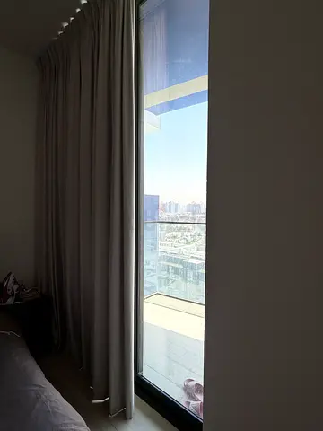 Light-blocking grey curtains with curtain rod
