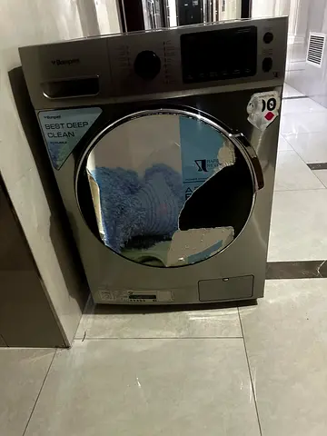 Front load washing machine (used) - Good condition / broken drum