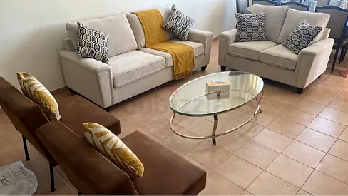 Light beige 2-seater and 3-seater sofa set with glass coffee table and 2 leather chairs
