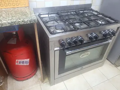Gas stove with cylinder