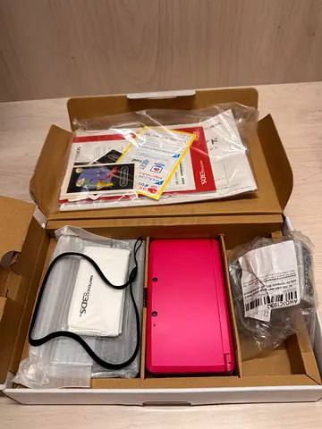 Nintendo 3ds l gloss pink with 128gb l More than 100 games l price final