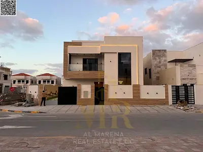 Luxury corner villa for sale in Al Zahia, Ajman | Two floors + roof | Land area 4,050 sq ft | Built-up area 4,000 sq ft | 5 master bedrooms | Majlis a