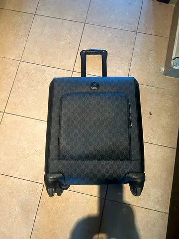 Gucci Compact rolling luggage suitcase with extendable handle - perfect condition