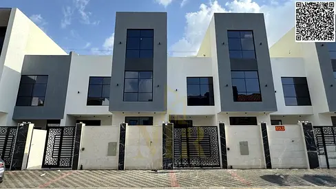 Luxury villa for sale in Al Yasmin, two floors and a roof with a back garden and modern design, including registration fees.