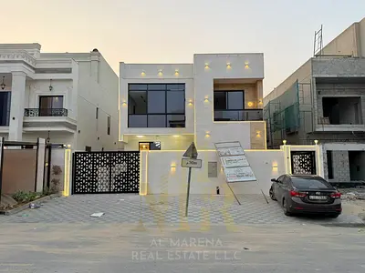 Villa for sale in Ajman | Al Amrah area | 5 bedrooms, living room, majlis, and swimming pool | Freehold for all nationalities | Price includes registr