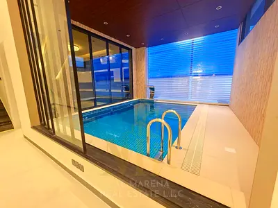 Villa for sale with a swimming pool. Price includes registration and ownership fees, electricity, water, and air conditioning. Negotiable. Located nea