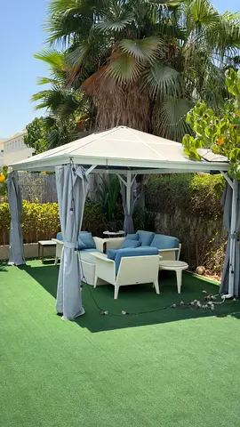 8 months used Danube Outdoor Garden Gazebo with Curtains ( furniture not included)
