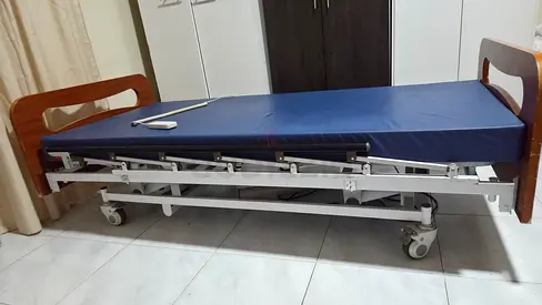 Hospital adjustable medical bed with mattress, on wheels - good condition