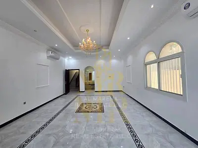 Villa for sale – Al Muwaihat 1, Ajman | Two floors and a roof terrace behind Nesto | Prime location, ready to move in | Luxurious design | Includes el