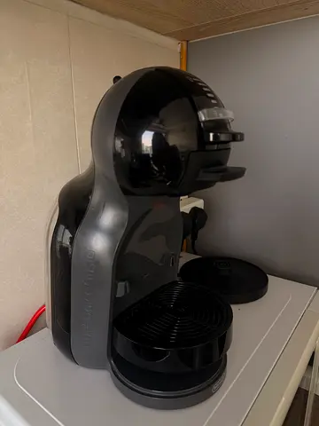 Compact single-serve pod coffee machine Delonghi (used) - black, descaling for free