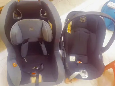Pair of infant car seats / baby carriers - good condition