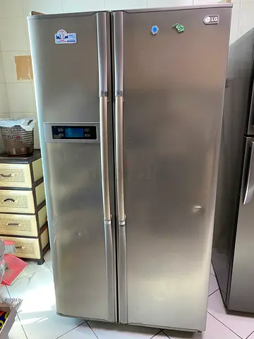 LG Stainless Steel Side-by-Side Refrigerator - Good Working Condition
