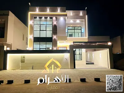 Villa for sale in Ajman | Al Helio 2 area | 5 bedrooms, majlis, hall, maid's room and roof | Freeho