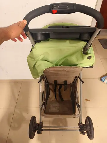 Lightweight green single stroller in good used condition. Graco brand