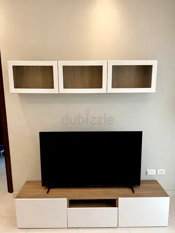 Modern white and wood TV unit with wall cabinets - good condition + TV Philips 50 inch