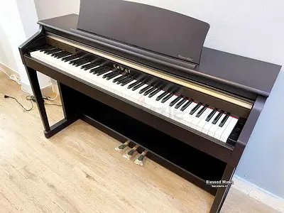 Kawai CA15R Wooden key piano as good as new. With matching bench. Cash on delivery with warranty.