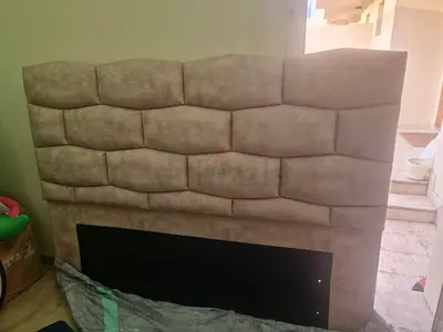 Light pink upholstered bed armrest - good condition