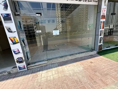 Shop for annual rent in Al Rashidiya 3 Excellent location with easy access Suitable for any commercial activity Large area 100,000 SAR annually