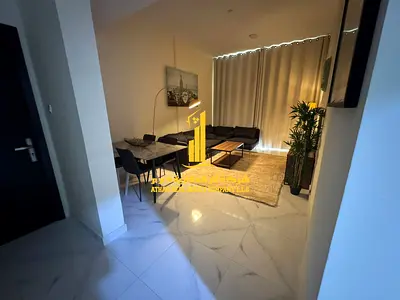 Luxury apartment, second occupancy, two bedrooms, living room, and open balcony. Ajman, Al Hamidiya. Fully furnished, for monthly rent.
