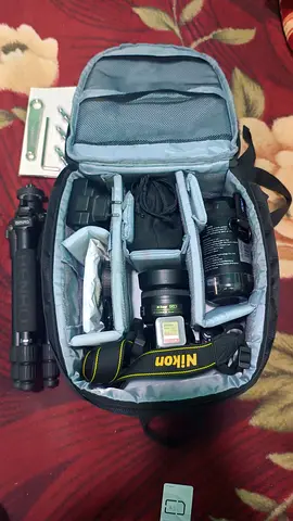 Nikon D3500 Complete Photography Combo (35mm f1.8 + Kit Lens + Benro Tripod + Backpack)