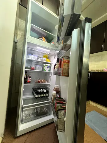 Used side-by-side refrigerator in good condition