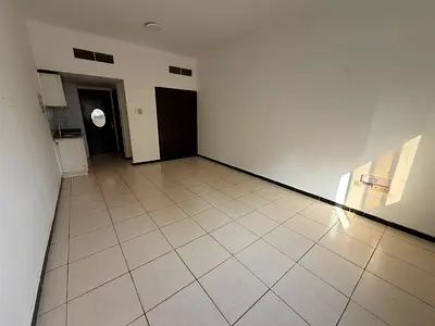 Luxury annual studio for rent in Al Rashidiya 3, Ajman. Built-in wardrobes, prime location near Ajman One Towers and Ajman Corniche.