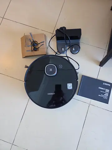 ECOVACS DEEBOT robot vacuum with charger and spare brushes - good condition