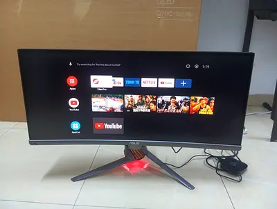 The ASUS ROG Swift PG348Q is a 34-inch curved ultrawide gaming monitor featuring a 3440x1440 QHD