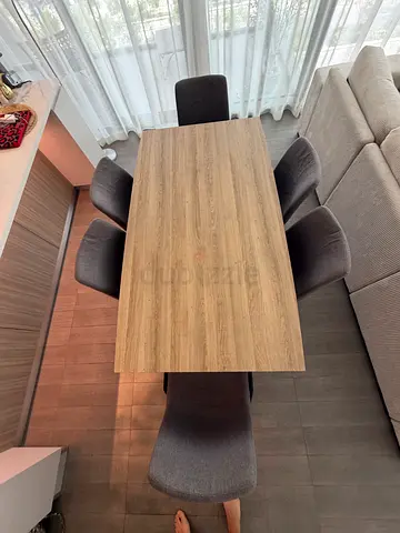 Wooden dining table with 6 upholstered chairs - good condition
