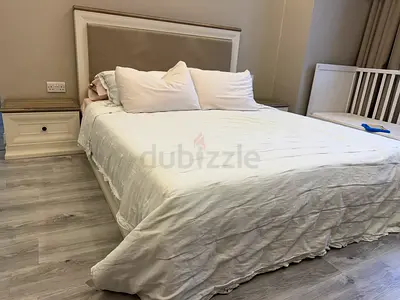 Modern Queen Sized Bed with Padded Headboard